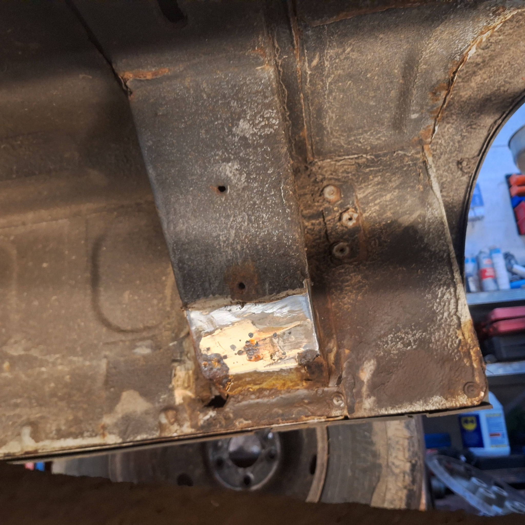 Rusted metal vehicle part