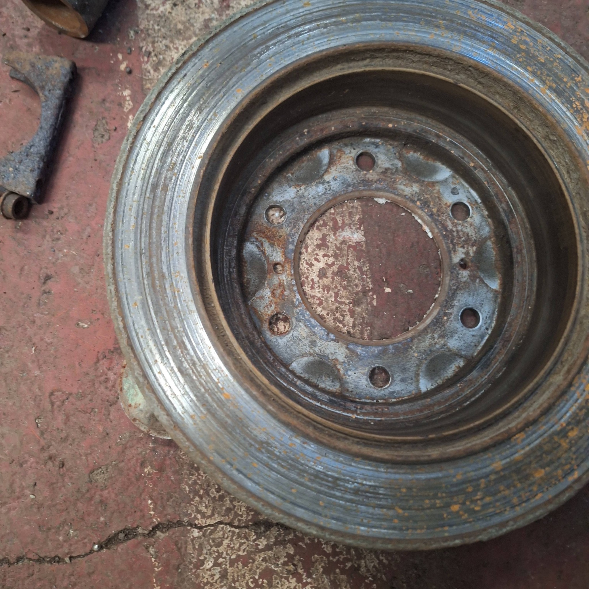 Rusted vehicle wheel and tyre