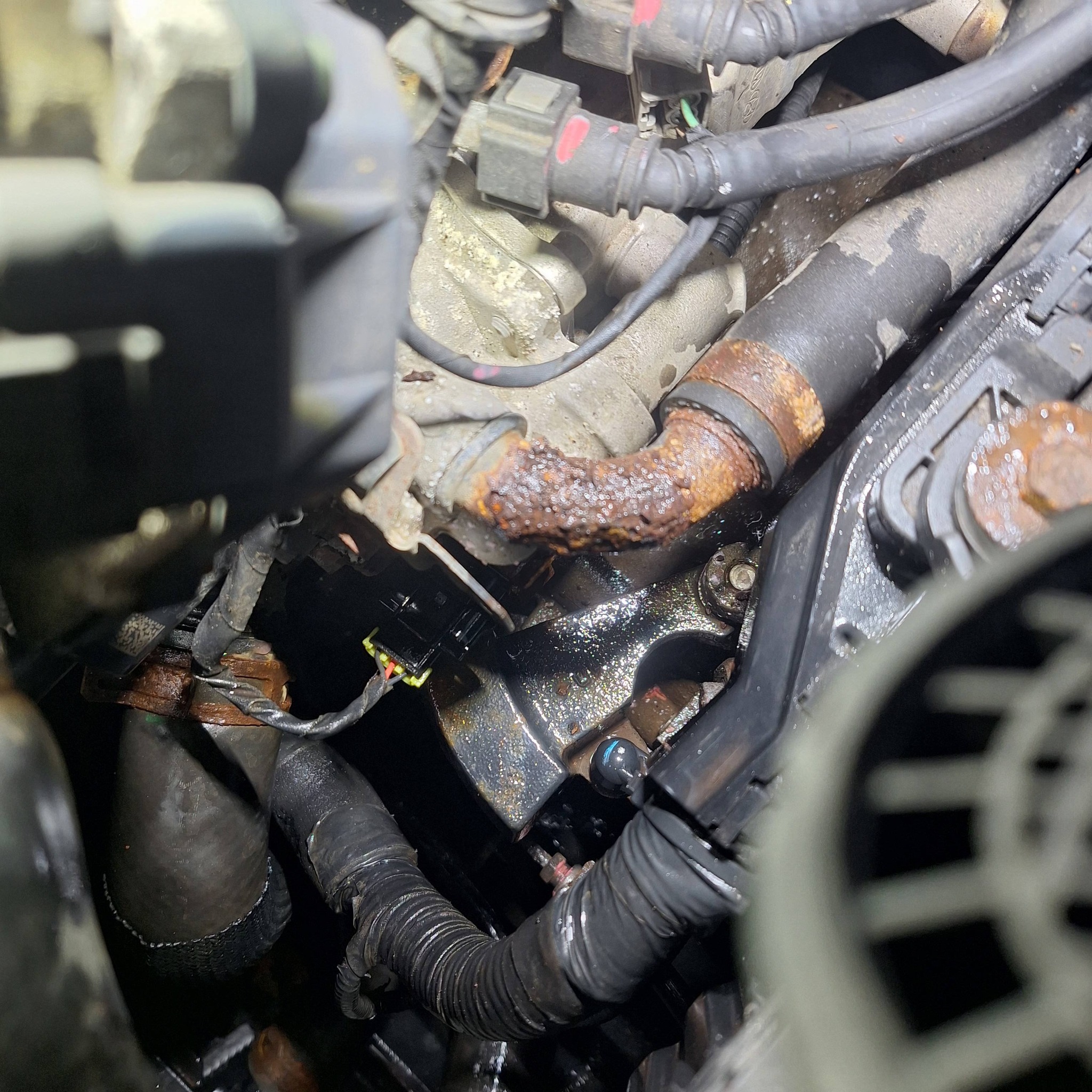 Rusty exhaust pipe and engine components
