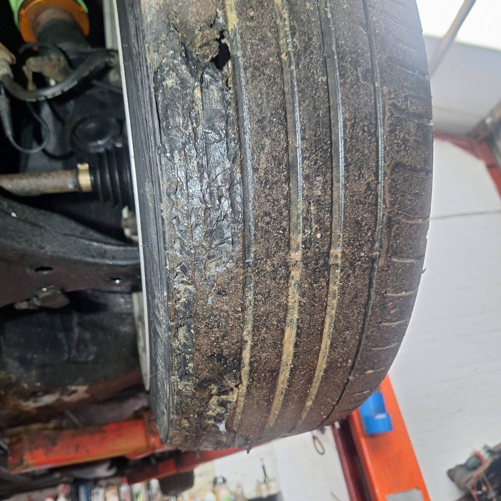 Close-up of worn vehicle tyre