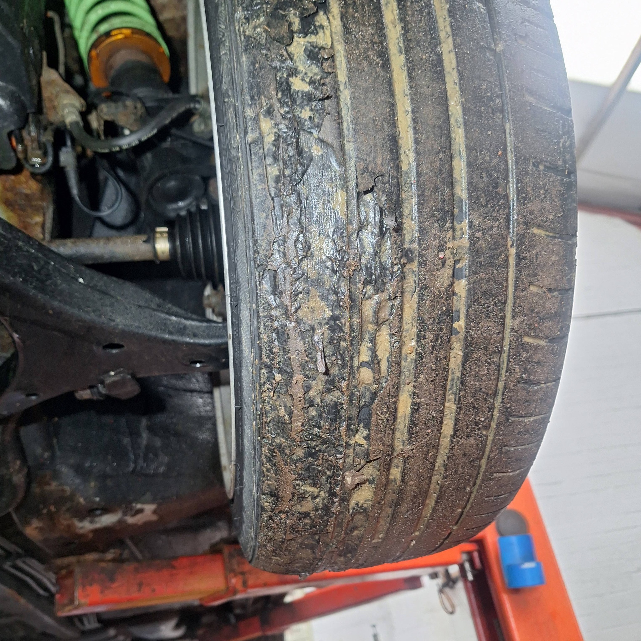 Worn tyre with tread damage